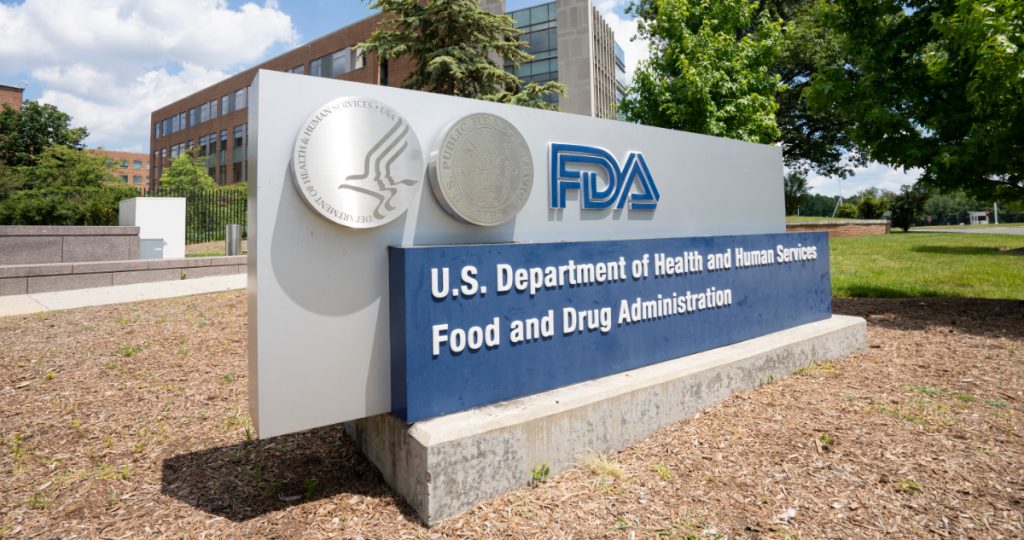 A sign for the US Food and Drug Administration outside an FDA building