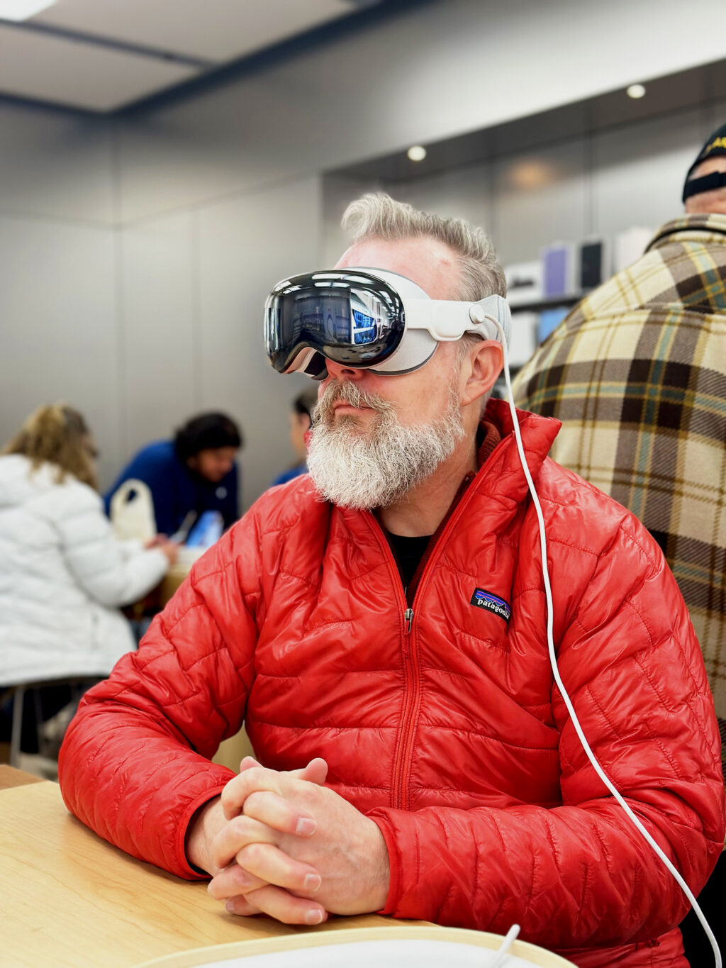 Me, wearing the Vision Pro while testing at an Apple Store.
